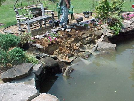 The dirt from the edge slid into the water